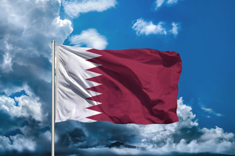 Qatar National Flag. shutterstock 1 december 2021